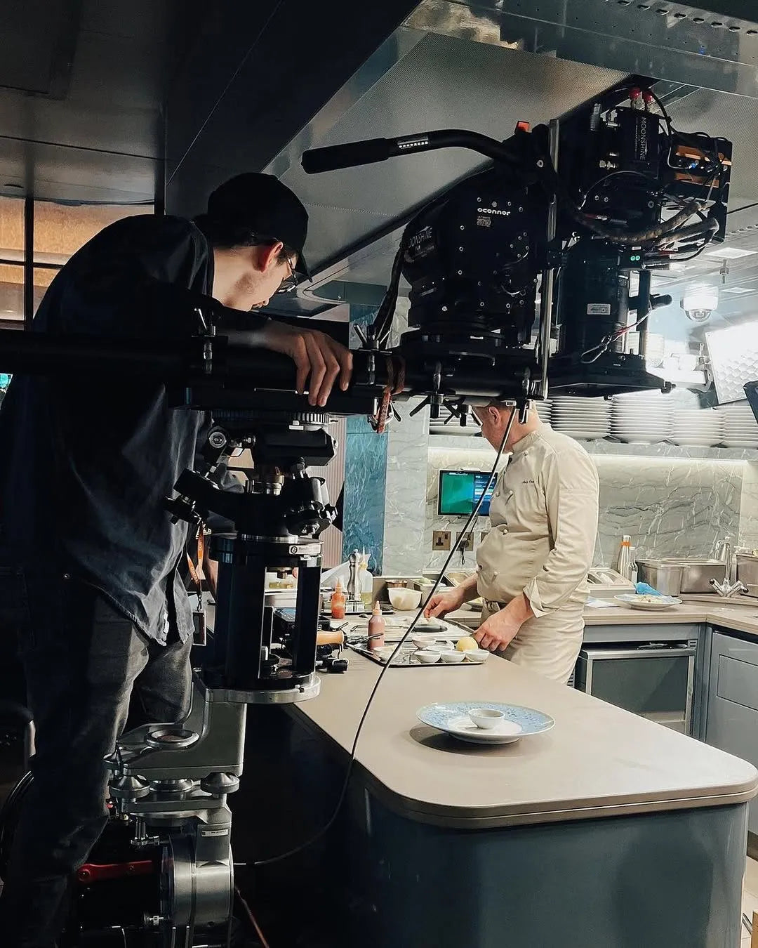 Film crew hire in London.  Crew setting up the camera equipment.